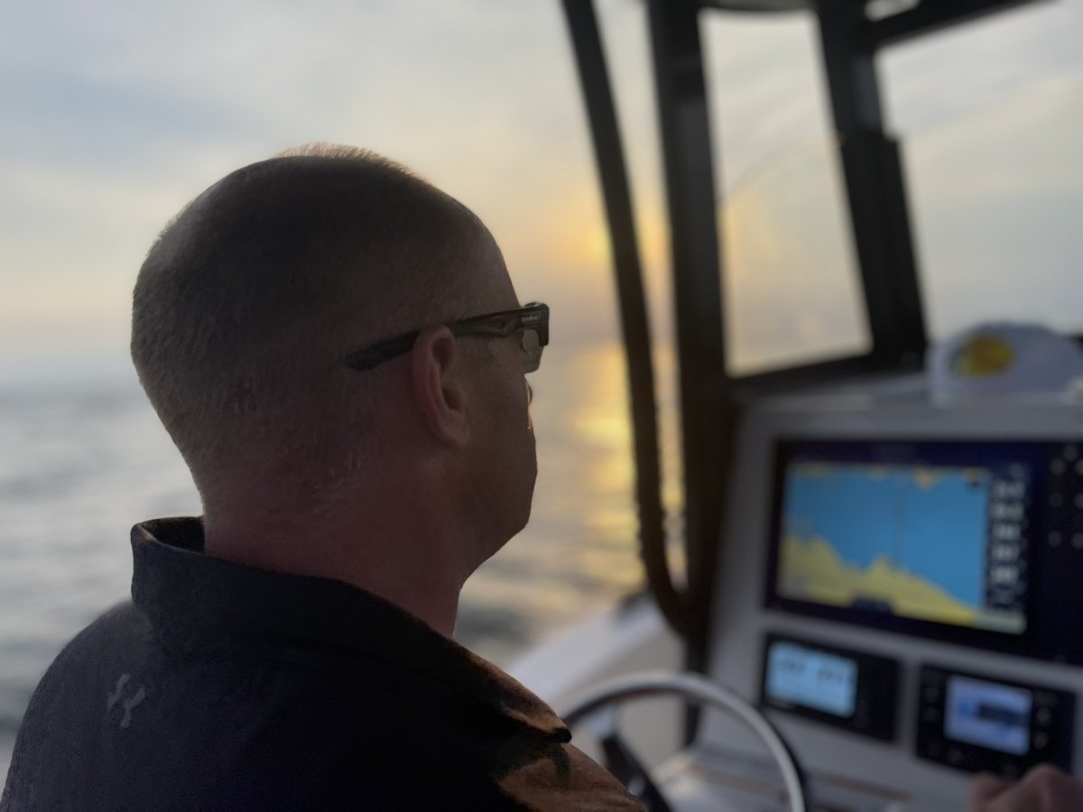 Michael Galli at the controls of an R-44 helicopter at Harris Airport